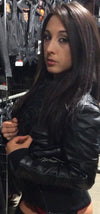 Milwaukee Leather women's black 3/4 leather hoodie jacket with reflective tribal design, shown from the side.