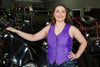 Women's purple genuine leather motorcycle vest with lace-up sides, fully lined, by Buffalo Leather Gear, displayed in multiple colors.