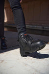 Milwaukee Leather women's black leather biker boots with 9-inch height, triple buckles, side zipper, and rugged design.