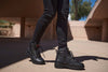 Milwaukee Leather Women's black leather biker boots with 9-inch triple buckle design and side zipper entry.