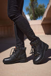 Milwaukee Leather Women's black leather biker boots with 9-inch triple buckles, side zipper, and sturdy sole.