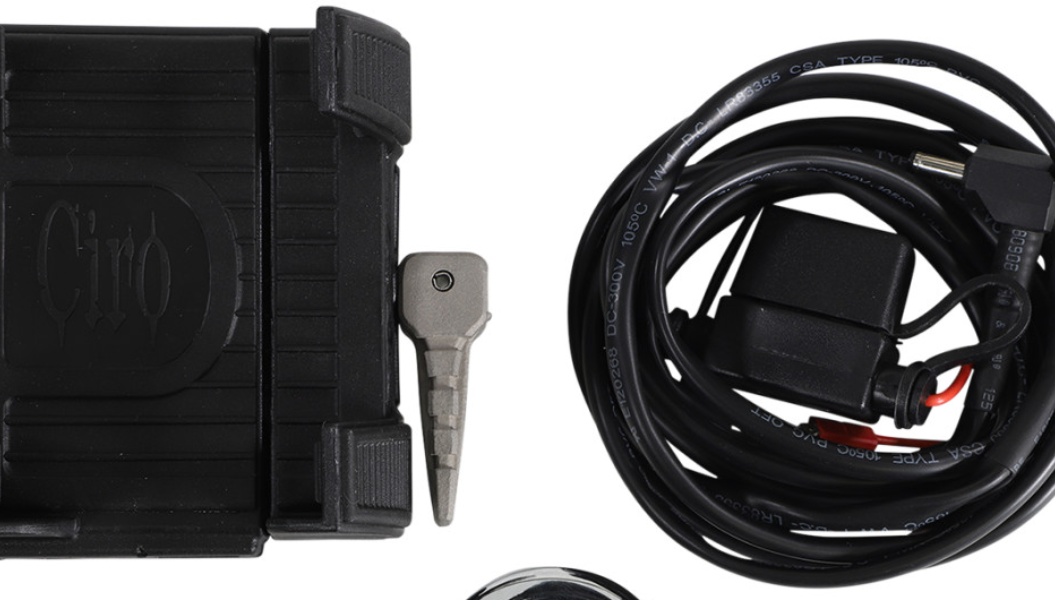 Chrome motorcycle accessory with charger port, designed for durability and style, by Drag Specialties.