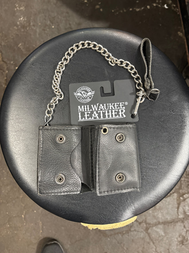 Black tri-fold chain wallet by Dealer Leather featuring a metal chain and multiple card slots for secure storage.