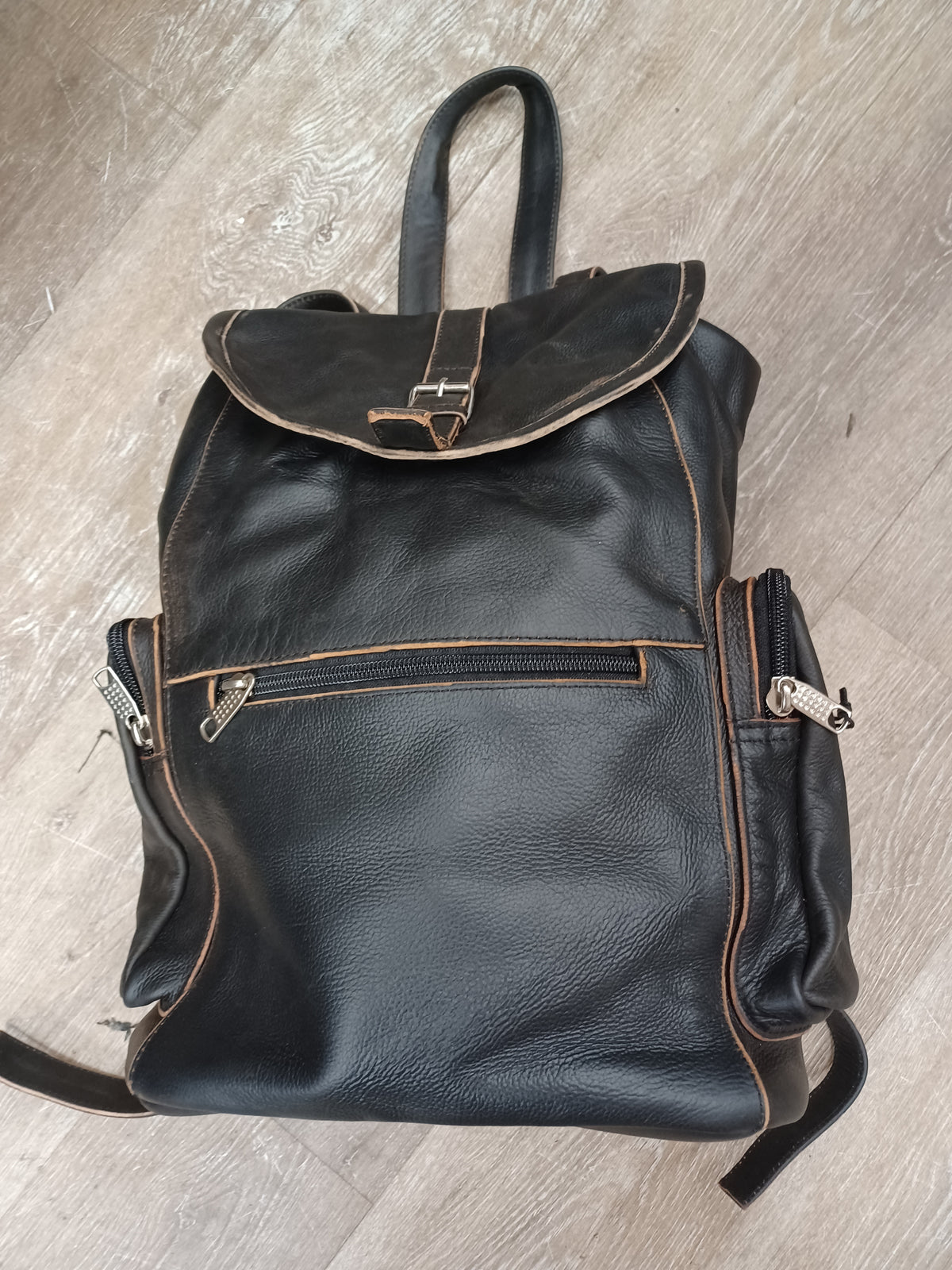 Buffalo Leather Gear BUFF BROWN leather backpack with handcrafted biker bag design, featuring sturdy straps and multiple compartments.