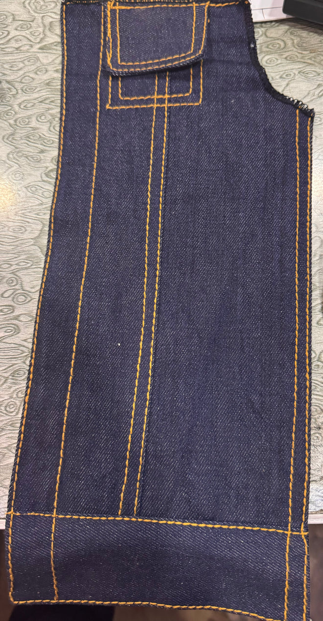Men's vest by Buffalo Leather Gear featuring contrast golden thread and original blue denim fabric with stylish details.