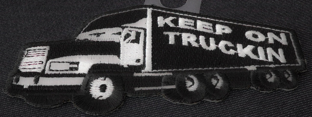 Keep On Trucking P4103 patches from THE CHEAP PLACE, featuring vintage truck design on fabric patches.