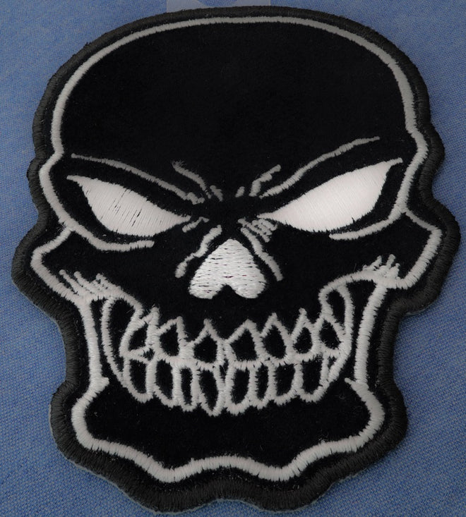 Black skull patch by THE CHEAP PLACE, small 3x4.25 inch fabric patch with detailed skull design
