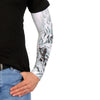 Hot Leathers Assassin arm sleeve in black with white skull and dagger design, extending from wrist to upper arm.