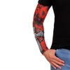 Hot Leathers Celtic Cross arm sleeve showing detailed black and white design on stretchy fabric for motorcycle or casual wear.