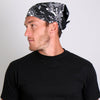 Black paisley skull bandana by Hot Leathers featuring bold skull and paisley design, made of soft fabric for a stylish look.