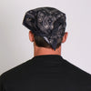 Black and white Flying Eyeball Paisley bandana by Hot Leathers with bold paisley and eyeball design, made of soft fabric.