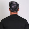 Hot Leathers Ancient Skulls bandana featuring skull and tribal designs, black and white fabric with bold graphic print.