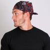 Red paisley skulls bandana by Hot Leathers featuring bold paisley and skull design on fabric.