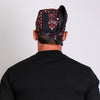 Red paisley skull bandana by Hot Leathers, featuring bold skull and paisley design, perfect for motorcycle and casual wear.
