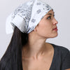 White paisley bandana by Hot Leathers, classic design with intricate paisley pattern, made from soft fabric suitable for casual wear.