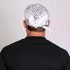White paisley bandana by Hot Leathers featuring classic design, displayed flat with visible paisley pattern and edges.