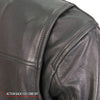Black leather women's motorcycle jacket by Hot Leathers with plaid flannel lining and silver hardware details.