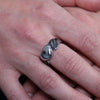 Hot Leathers Women's Silver Winged Heart stainless-steel ring, close-up showing detailed wing and heart design.