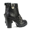 Milwaukee Leather Women's black leather platform boots with straps, stylish footwear with chunky soles and buckle details.