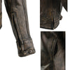 Close-up of Milwaukee Leather Women's distressed brown leather scooter jacket with vented design and detailed stitching.