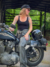 Milwaukee Leather women's grey distressed leather chaps with accent lace and grommet details, designed for motorcycle riding.