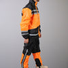 Hot Leathers orange and black unisex waterproof rain suit, lightweight rainwear with hood and reflective details, suitable for all weather.