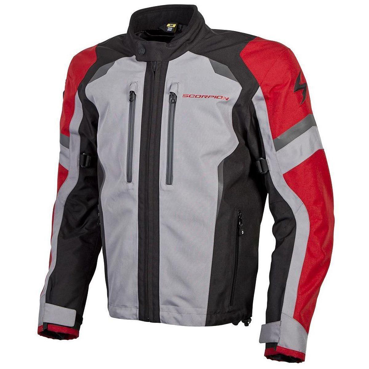 Tour Master Synergy 7.4V women's soft shell heated jacket in red, featuring heating elements and a sleek, fitted design.