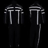 Milwaukee Leather black men's rain suit with water resistance and reflective tape, shown in night view.