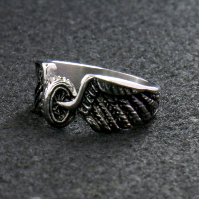 Hot Leathers Silver Wing Wheel stainless steel ring, a detailed motorcycle-themed accessory with wing and wheel design.