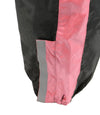 Milwaukee Leather NexGen Ladies XS5001 black and pink waterproof rain suit with reflective piping, shown close-up detail.