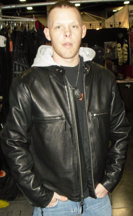 Men's leather jacket by DynamicLeather with zip-off hood and pockets, featuring a stylish front view and detailed stitching.