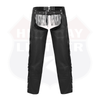Back of black leather chaps with studded belt and fringe across the waist