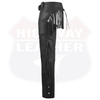 Side view of black leather chaps showing tassel fringe along the outer leg