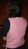 Back view of women’s pink leather vest by Buffalo Leather Gear featuring braided detailing and a fitted design.