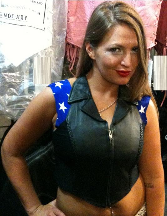 Women’s leather halter top with a braided crisscross design, stylish vest by HighwayLeather.