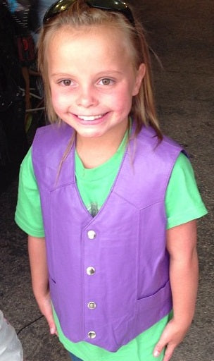 Purple kids leather vest by Leather Headquarters, featuring a soft leather design perfect for children's stylish outdoor wear.