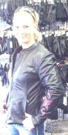 Hot pink butterfly leather women's jacket with reflective details, stylish HighwayLeather design, showcasing the vibrant color and unique pattern.