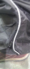 Dynamicleather unisex rain suit with pants and jacket, featuring zipper closures, designed for waterproof protection.