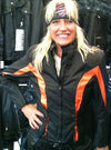 Women textile motorcycle jacket by Dynamicleather in vibrant orange, featuring a fitted design and protective padding.