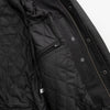 Men's black woolen varsity jacket with leather sleeves by FIRST MFG, featuring a classic varsity style and ribbed collar.