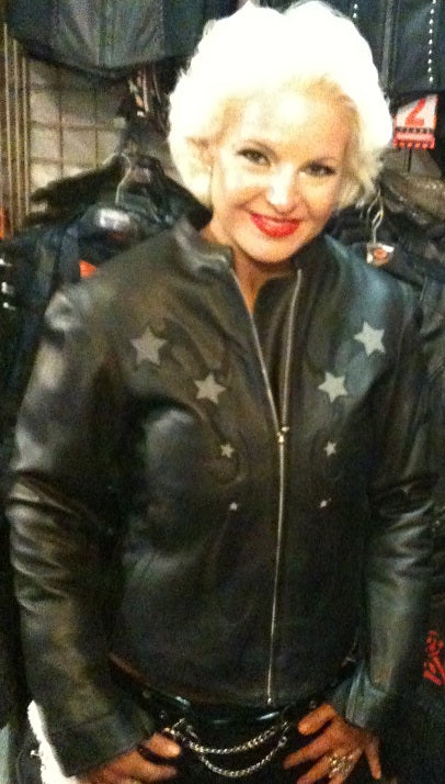 Reflective star leather jacket for women by HighwayLeather, stylish black motorcycle jacket with star and reflective details.