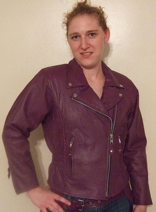 Women’s purple leather jacket by Dynamicleather, stylish and fitted with a smooth texture, front zipper, and classic collar.
