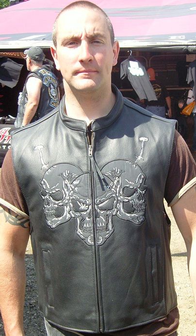 Dynamicleather skull leather biker vest featuring front skull design, black leather material, and classic motorcycle vest style.