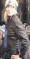 Buffalo Leather Gear Bombshell leather women's jacket with side buckle, featuring sleek design and stylish details.