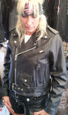 Buffalo Leather Gear women's full-length motorcycle jacket with side lace design and ammo pocket detail.