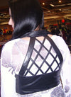 Women’s leather halter top with braid design, stylish women’s vest by Dynamicleather, featuring back detail and modern fashion style.