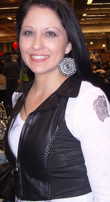 Women’s leather halter top with braid design, stylish women’s vest by HighwayLeather, featuring a sleek and fashionable look.
