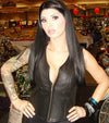 Women's leather vest by Dynamicleather with rivet details, front zipper closure, and a stylish design perfect for edgy fashion.