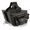 Dynamicleather biker bag with double front pockets, studded PVC material, reflective piping, and saddle bag style for motorcycles.