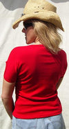 Red women's studded accent slit neck top by Dynamicleather, showing silver studs and back view of stylish textile clothing.